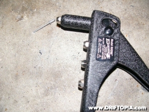 Image of a rivet and rivet gun used to make the CAI heat shielding for the ca18det swapped 240sx s13
