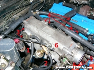 Image with bolt removal locations labeled for the removal of the upper intake manifold from the ca18det.