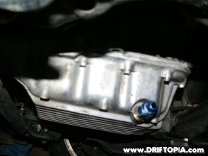 The npt drain fittings are installed in place of the oil drain plug on the s2000