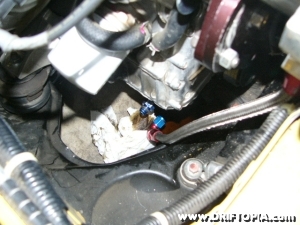 install the oil drain line from the outlet on the comptech supercharger to the oil drain fitting in the s2000 oil pan.
