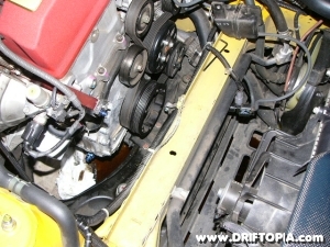 Image showing the dented cross-member required to clear the oil drain on the comptech supercharged s2000.