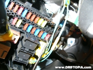 Image of the Fuse block under the dash on the honda s2000.  The fuel pump fuse is located near the metal pick.