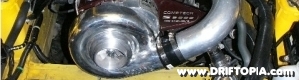 Slim jpeg of the comptech supercharger installed on the honda s2000