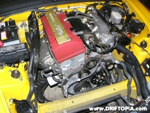 The engine bay of the s2000 will look like this with the intake removed.