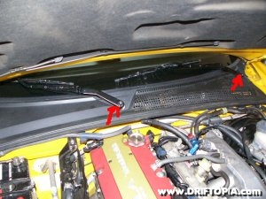 Jpg image showing the plastic trim that needs to be removed in order to access the routing path for the boost lines on the Comptech S2000