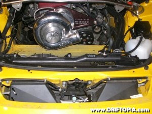 Jpg image of the S2000’s engine bay minus the charge pipe and the radiator shroud.