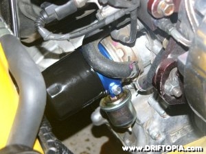 Jpg image of the oil filter and adpter plate installed on the block of the Honda S2000.