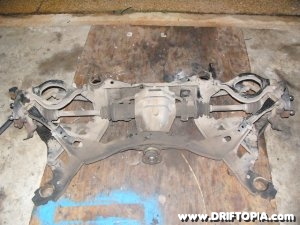 Jpg image of the rear subframe bushings removed from the 240sx