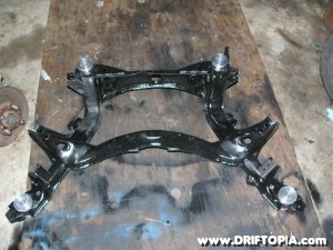 The solid aluminum bushings installed into the Nissan 240sx Subframe