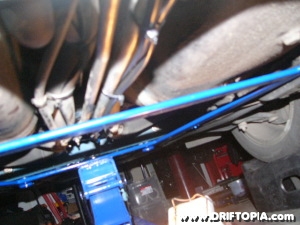 The new battery cables will follow the hard lines underneath the MR2 Spyder