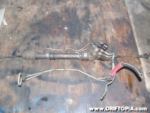 Image of the factory steering rack from the Nissan 240sx s13