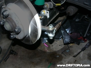 The new tie rod ends on the Nissan 240sx.