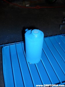 After a through cleaning and sanding, I decided to powdercoat the reservoir.  This image shows the coat media sprayed on.