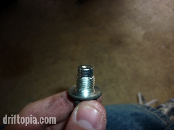Make sure the threads on the oil drain plug are clean before reinstalling the plug into the oil pan.