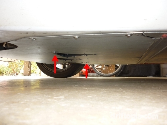 The two 13mm bolts are located on either side of the row of NACA ducts.