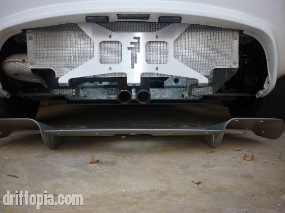 This image shows the rear panel eliminator from Sector111.  It is a light weight license plate holder that saves about 4.5 lbs in place of the stock panel.  It also allows more airflow through the rear end