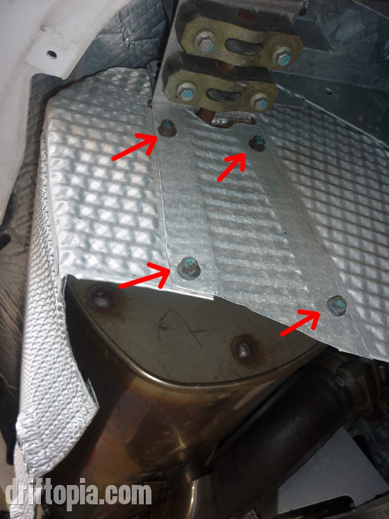 There are two access panels (one per side) that must be removed from the stock muffler's heat shield.
