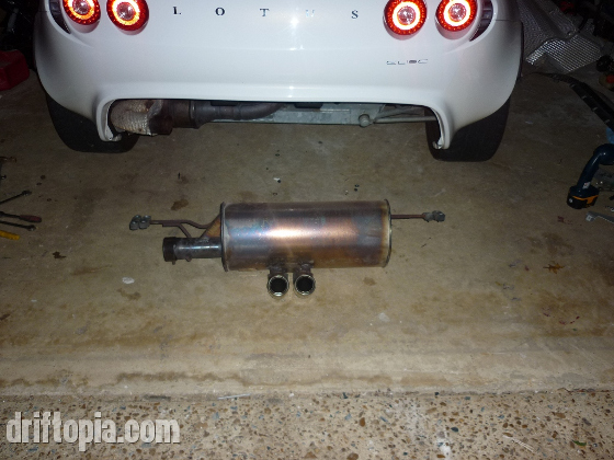 The factory exhaust removed from the Lotus Elise.