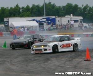 Image of two professional drifters racing at NOPI drift.