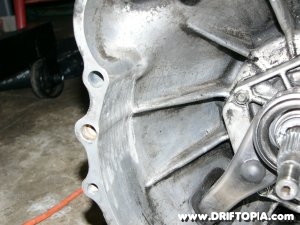 The bell housing of the ca18det ground down to accept a sr20det flywheel.