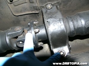 Image of the factory driveshaft center bearing assembly on a 240sx.