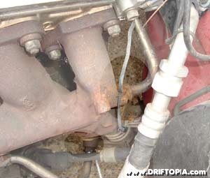 The egr tubes on the KA24DE connect at the single runner on the header.