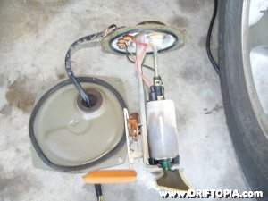 The stock fuel pump removed from a 240sx.