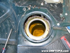Once the fuel pump is removed from the 240sx.  The fuel in the tank will be exposed.