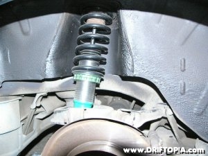 Tein basic coilovers installed in the rear of a S13 (240sx)