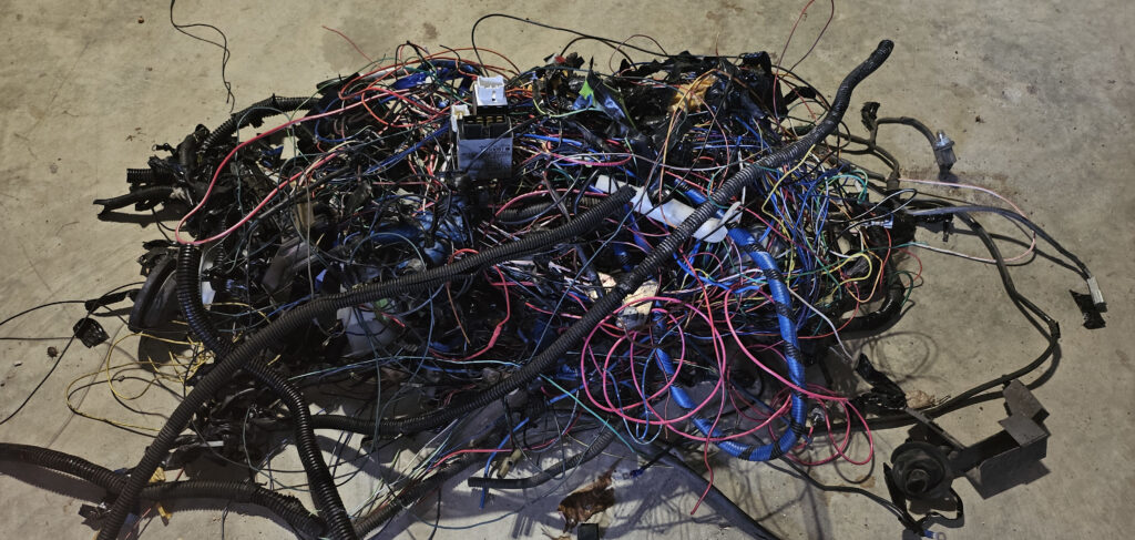 All of the cut wires from the NA Miata MX-5 in a bundle.